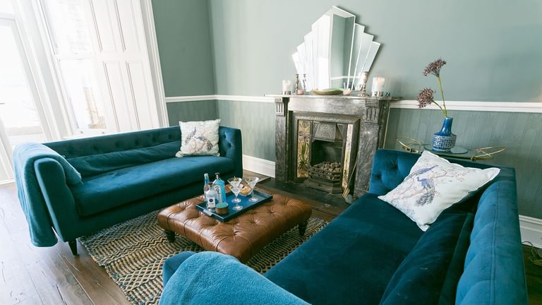 Craig Hyfryd Beaumaris Anglesey kitchen living blue sofas 1920x1080