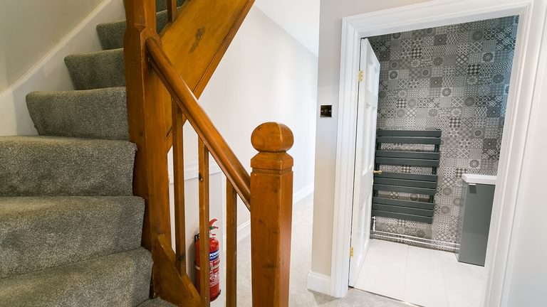Craig Hyfryd Beaumaris Anglesey stairs bathroom 1920x1080