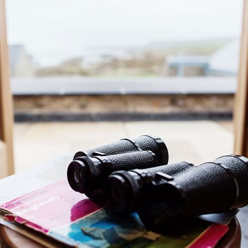Crows Nest Llanfaethlu Anglesey binoculars window 1920x1080