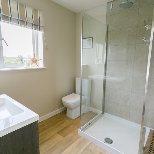 Ael Y Bryn Malltraeth Anglesey shower with sea views