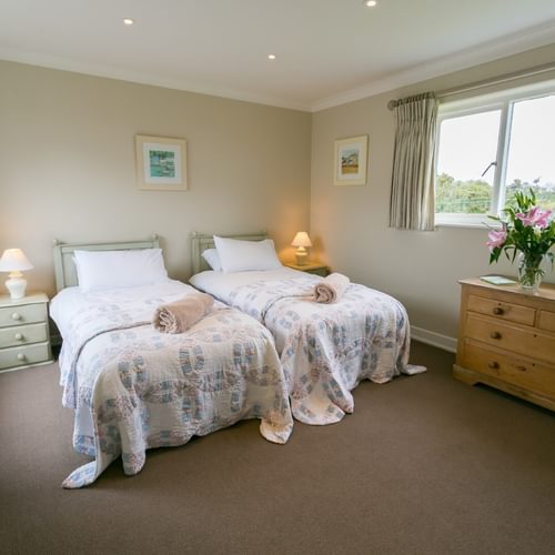 Ael Y Bryn Malltraeth Anglesey twin bedroom with ensuite from door