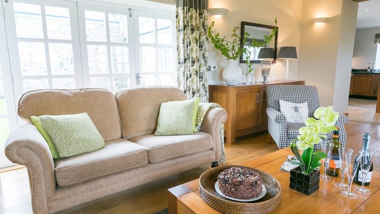 Botholes and Hideaways The Dairy Borthwen Barns Anglesey sitting room sofas