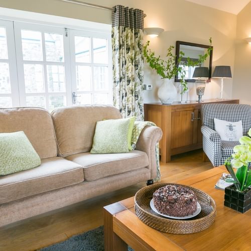 Botholes and Hideaways The Dairy Borthwen Barns Anglesey sitting room sofas