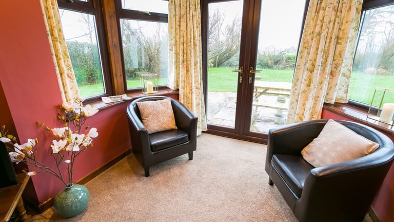 Boltholes and H Ideaways Erw Fach sitting room to garden 1620