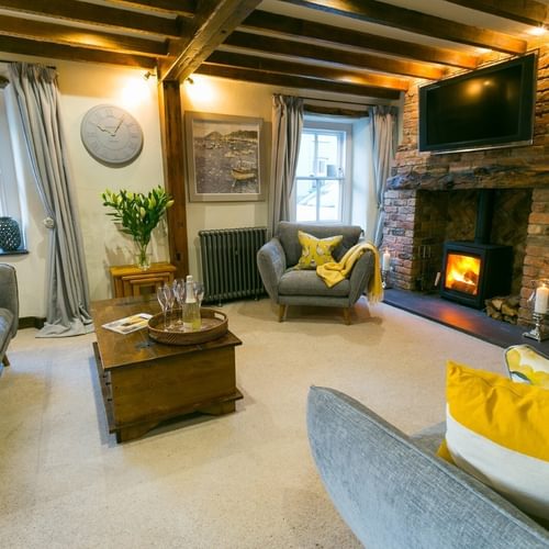 Boltholes and Hideaways 10 Bunkers Hill Beaumaris sitting room with log burner 1620