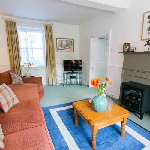 Boltholes and Hideaways Anglesey Plas Lligwy sitting room electric fire