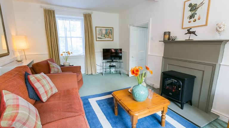 Boltholes and Hideaways Anglesey Plas Lligwy sitting room electric fire