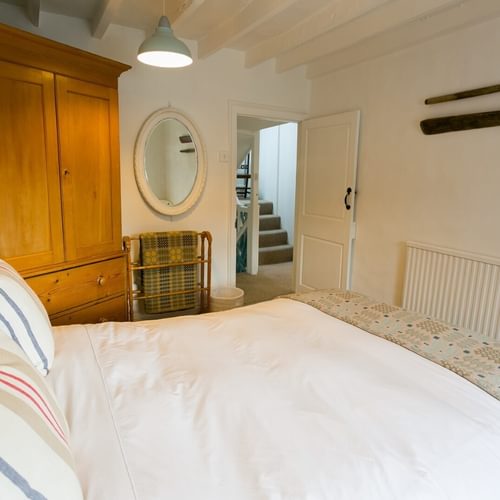 Boltholes and Hideaways Apple Tree Cottage Beaumaris dog friendly sleeps 6 double bedroom to landing 1666