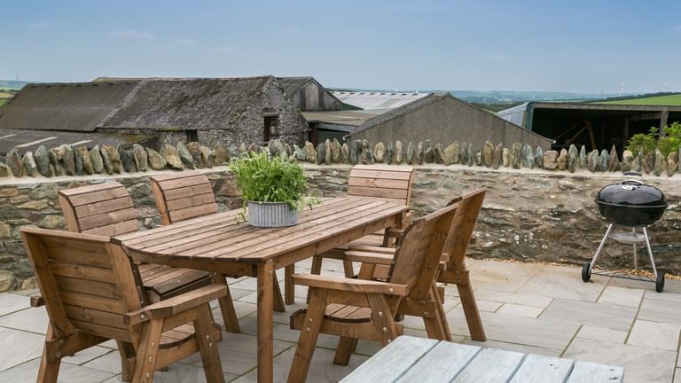Boltholes and Hideaways Bettws Farmhouse Cemaes Bay outdoor seating area and bbq