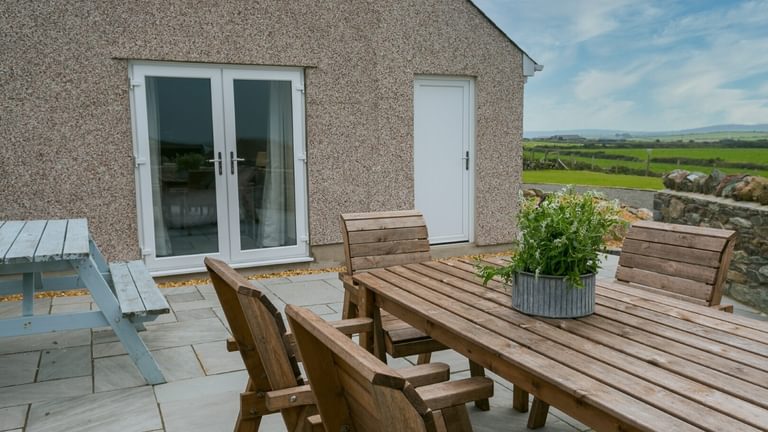 Boltholes and Hideaways Bettws Farmhouse Cemaes Bay outdoor seating area