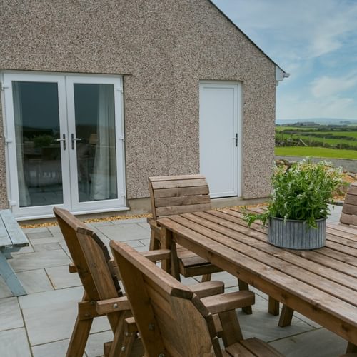 Boltholes and Hideaways Bettws Farmhouse Cemaes Bay outdoor seating area