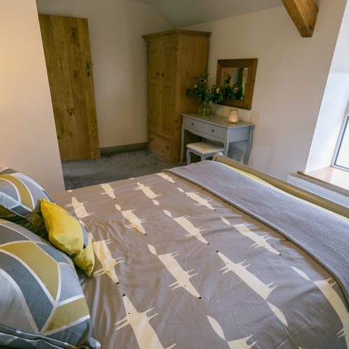 Boltholes and Hideaways Bettws Farmhouse Cemaes Bay bedroom 2 to window