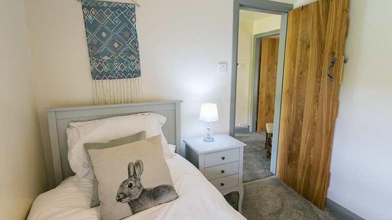 Boltholes and Hideaways Bettws Farmhouse Cemaes Bay bedroom to landing