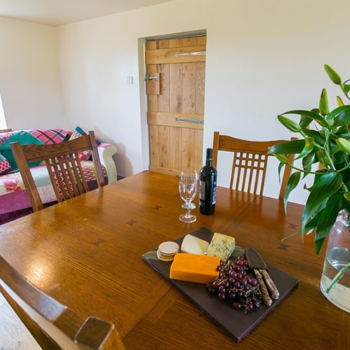 Boltholes and Hideaways Bettws Farmhouse Cemaes Bay dining room sofa