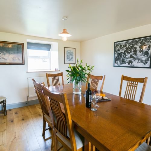 Boltholes and Hideaways Bettws Farmhouse Cemaes Bay dining room to window