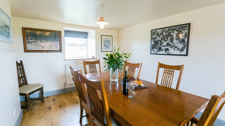 Boltholes and Hideaways Bettws Farmhouse Cemaes Bay dining room to window