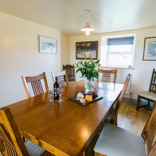 Boltholes and Hideaways Bettws Farmhouse Cemaes Bay dining room
