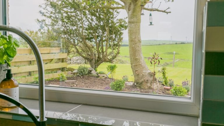 Boltholes and Hideaways Bettws Farmhouse Cemaes Bay kitchen view