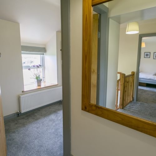 Boltholes and Hideaways Bettws Farmhouse Cemaes Bay landing mirror