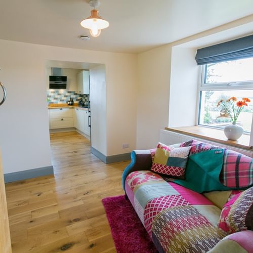 Boltholes and Hideaways Bettws Farmhouse Cemaes Bay seating area off kitchen