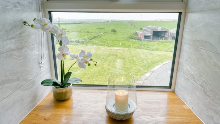 Boltholes and Hideaways Bettws Farmhouse Cemaes Bay window farm view