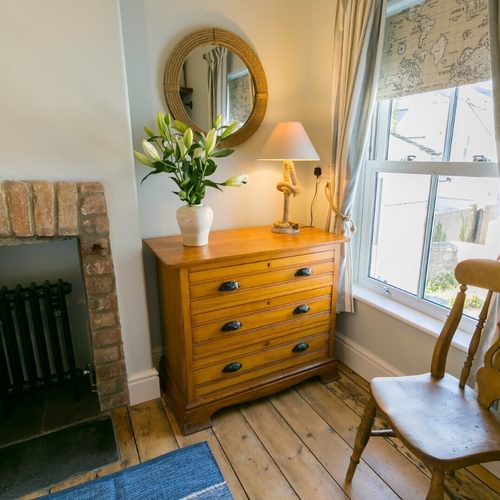 Boltholes and Hideaways Glan Y Mor Beaumaris sleeps 4 dog friendly chair twin bed