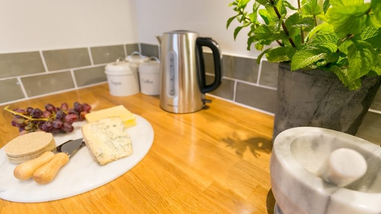 Boltholes and Hideaways Glan Y Mor Beaumaris sleeps 4 dog friendly kitchen cheese