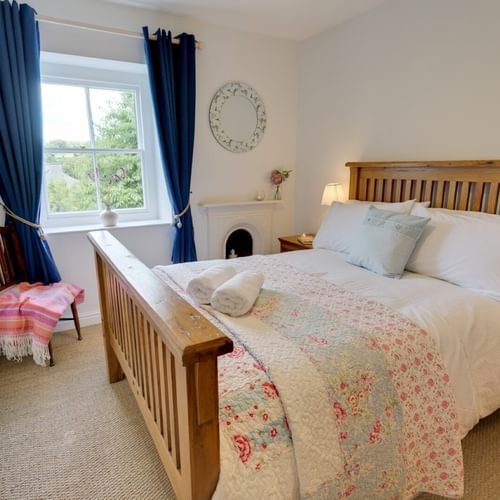 Boltholes and Hideaways Honey Hill Cottage Llangoed double bedroom garden side
