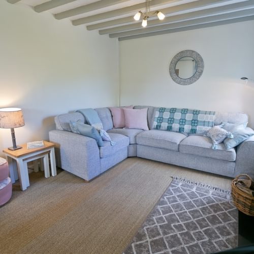Boltholes and Hideaways Honey Hill Cottage Llangoed seating area and fire