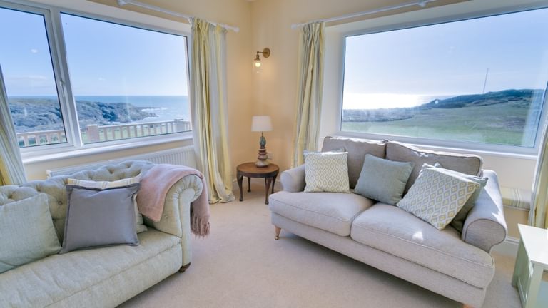 Boltholes and Hideaways Hafod Trearddur Bay Holiday Let Anglesey sofas and blue skies 1620