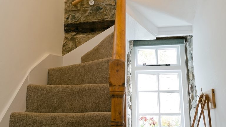 Boltholes and Hideaways Melvin Cottage Beaumaris stairs from sitting room 1080