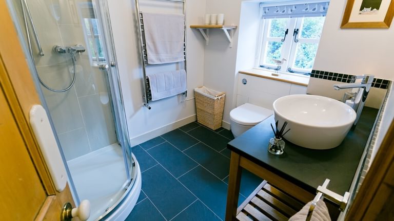 Boltholes and Hideaways Melvin Cottage Beaumaris shower room from hall 1620