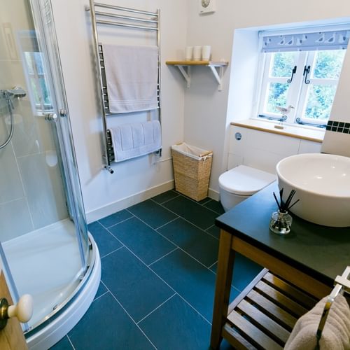 Boltholes and Hideaways Melvin Cottage Beaumaris shower room from hall 1620