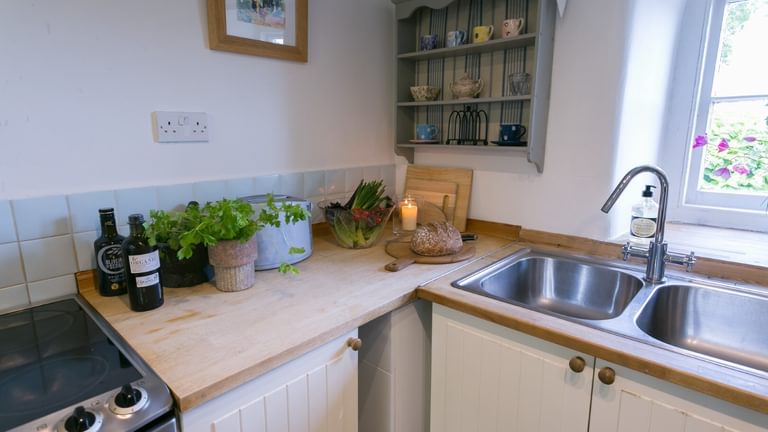 Boltholes and Hideaways Pentir Penmon kitchen sink with view