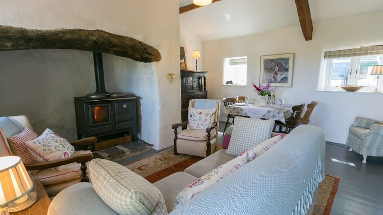 Boltholes and Hideaways Pentir Penmon sitting room to dining area