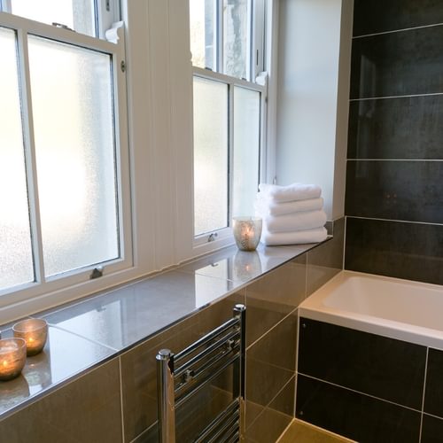 Boltholes and Hideaways Plas Y Coed bathroom with bath shower over