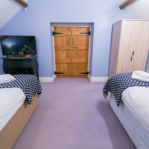 Boltholes and Hideaways Tal Y Bont Stables twin bedroom Harrier main house 1600