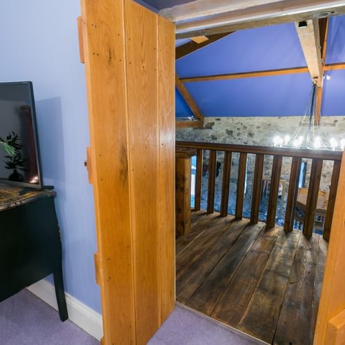 Boltholes and Hideaways Tal Y Bont Stables twin bedroom Harrier stairs to hall 1620
