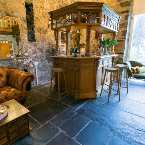 Boltholes and Hideaways Tal Y Bont Uchaf Stables bar in hall 1620