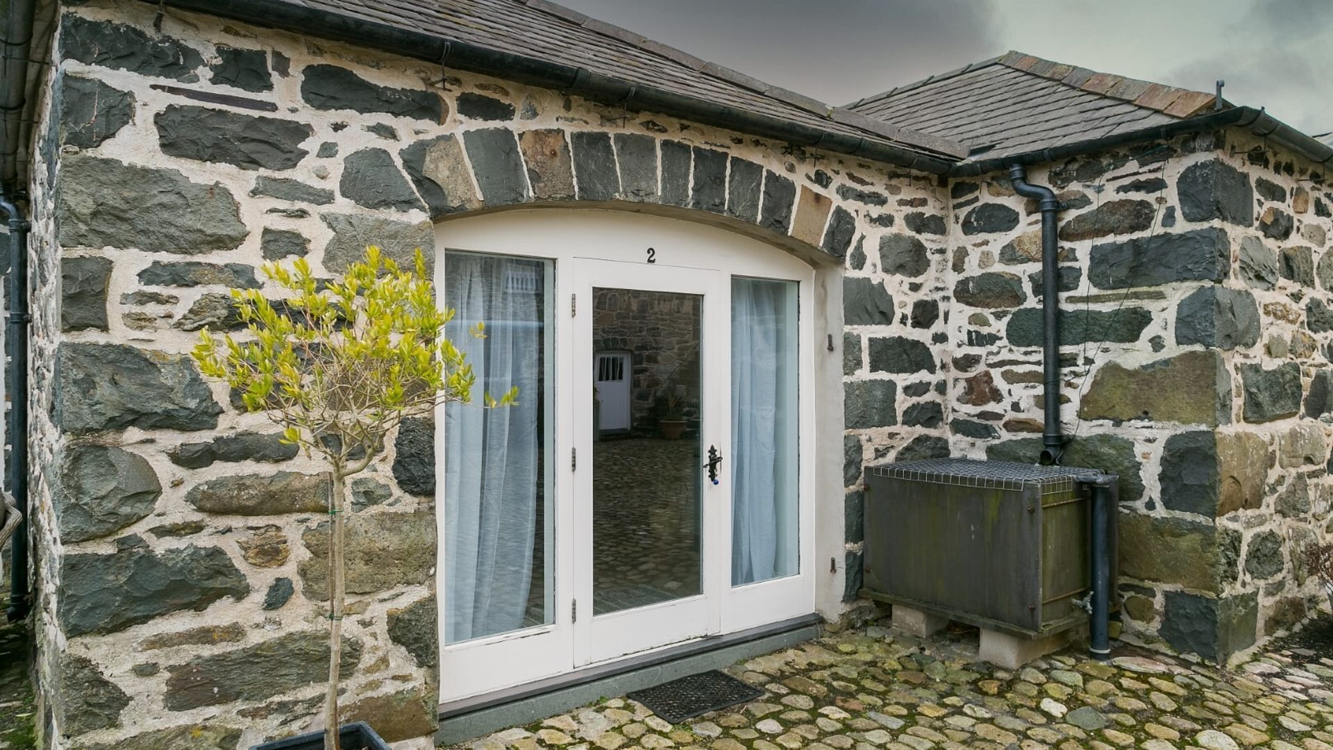 Boltholes and Hideaways Tal Y Bont Uchaf The Cottage main door Large