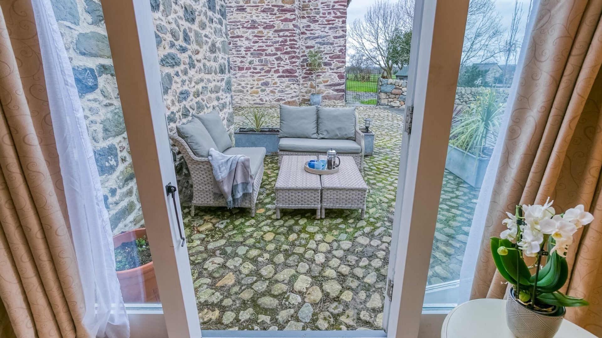 Boltholes and Hideaways Tal Y Bont Uchaf The Cottage sleeps 2 outdoor seating from bedroom Large