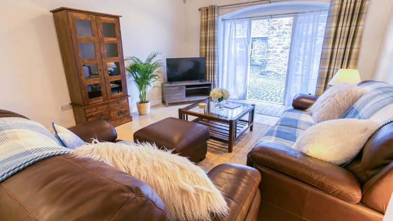 Boltholes and Hideaways Tal Y Bont Uchaf The Cottage sleeps 2 sitting room to front door Large