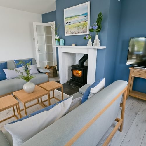 Boltholes and Hideaways Ty Glan Y Mor Aberffraw sitting room from french windows