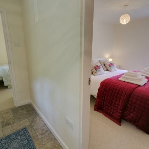 Boltholes and Hideaways Tyn Llan Master Bedroom and hall