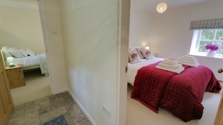Boltholes and Hideaways Tyn Llan Master Bedroom and hall