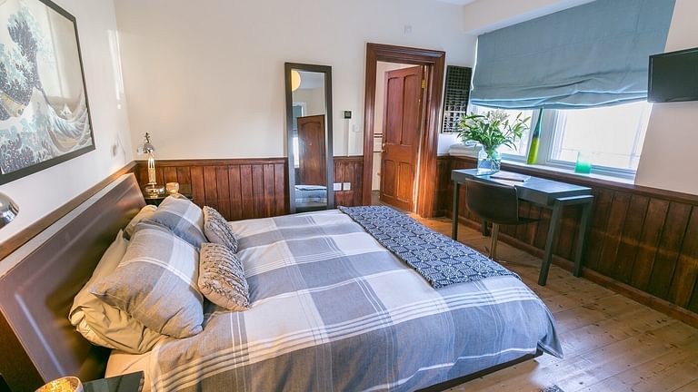 Boltholes and hideaways Capel Seion Coron master bedroom with ensuite