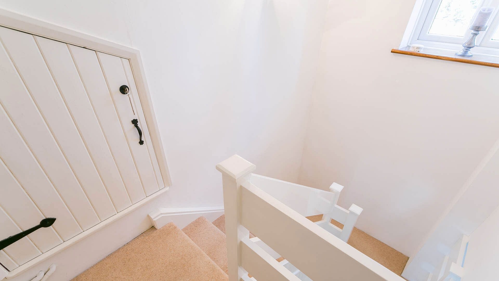 Gower Cottage Beaumaris Anglesey hallway stairs 3 1920x1080