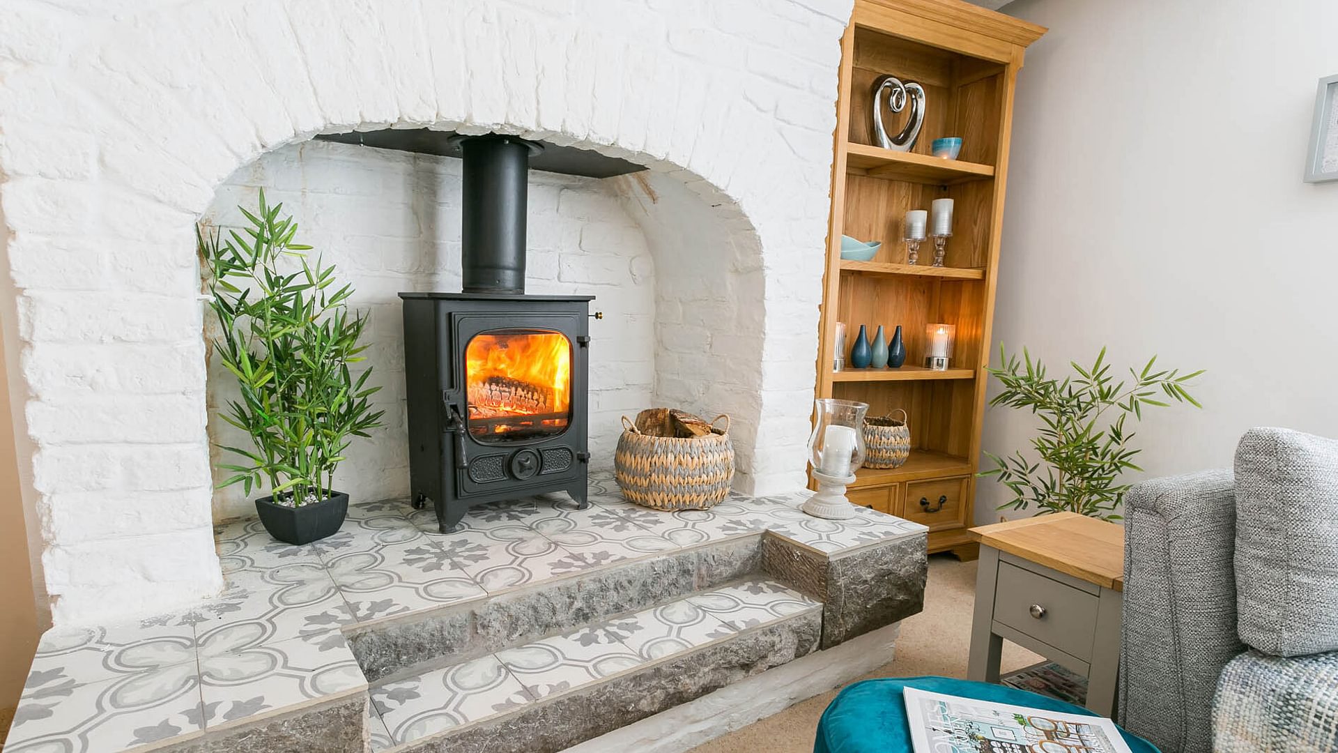 Gower Cottage Beaumaris Anglesey sitting room fireplace 1920x1080