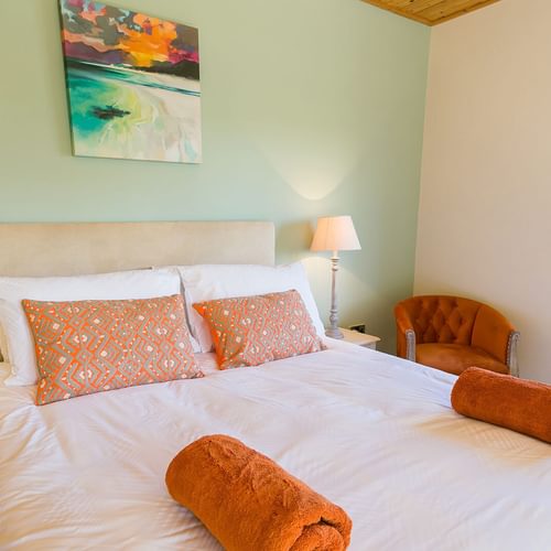 Glan Gors Felin Church Bay Anglesey king bedroom orange 1920x1080