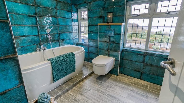 Gwynaeth Gwyn Llanddona Anglesey main bathroom blue 1920x1080